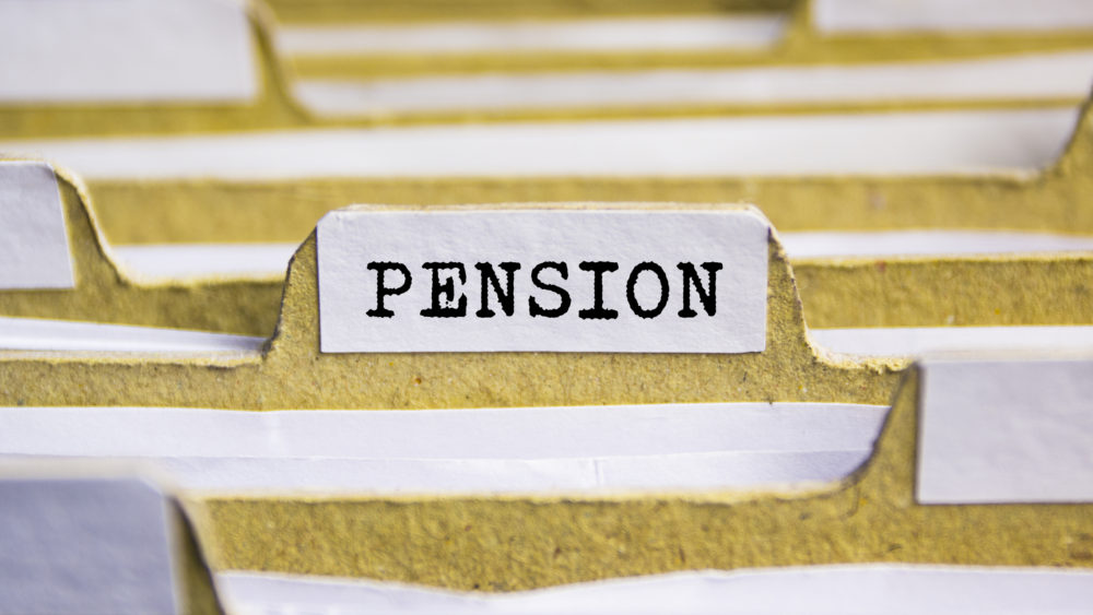 Index card with the word “pension”