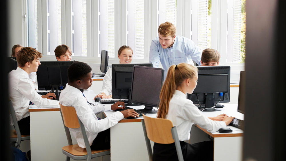 Teenagers in an IT class at school.