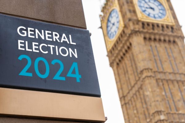 general election sign in front of the Palace of Westminster