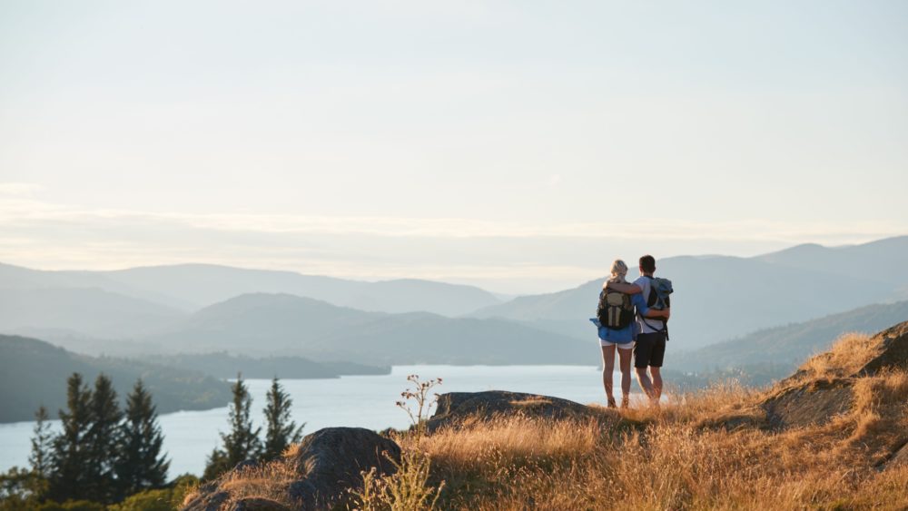 A couple hiking in the Lake District.
