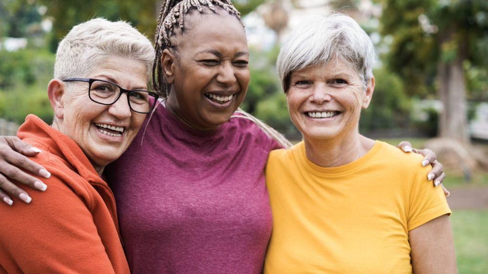 A group of women smiling.